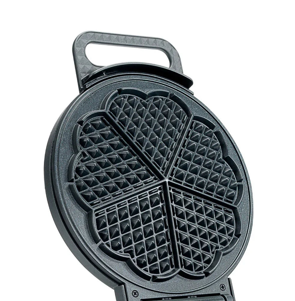 Opened waffle plates with deep diamond grid pattern inside waffle maker