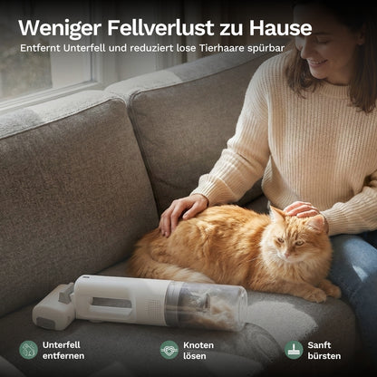 Handstaubsauger zur Fellpflege mit transparenter Staubkammer und Bürstenaufsatz