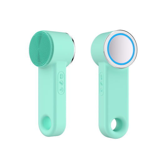 Two mint green Lazurec Care 083 Gesichtsreinigungsbürste devices—one with a textured silicone brush, the other with a smooth silver plate and blue ring. Both feature EMS-Funktion, buttons, and round openings at the handle ends.