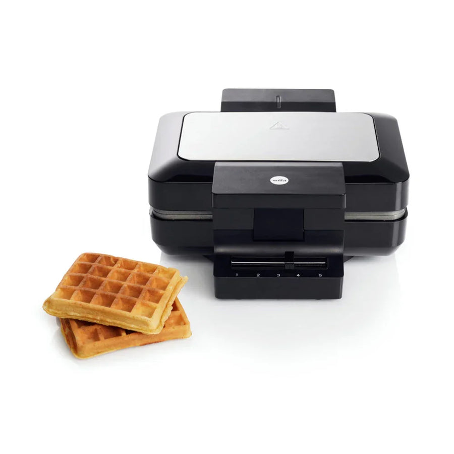 Belgisches Waffeleisen, geschlossen: schwarze Gehäuseteile, silberne Klappe, Kontrollskala